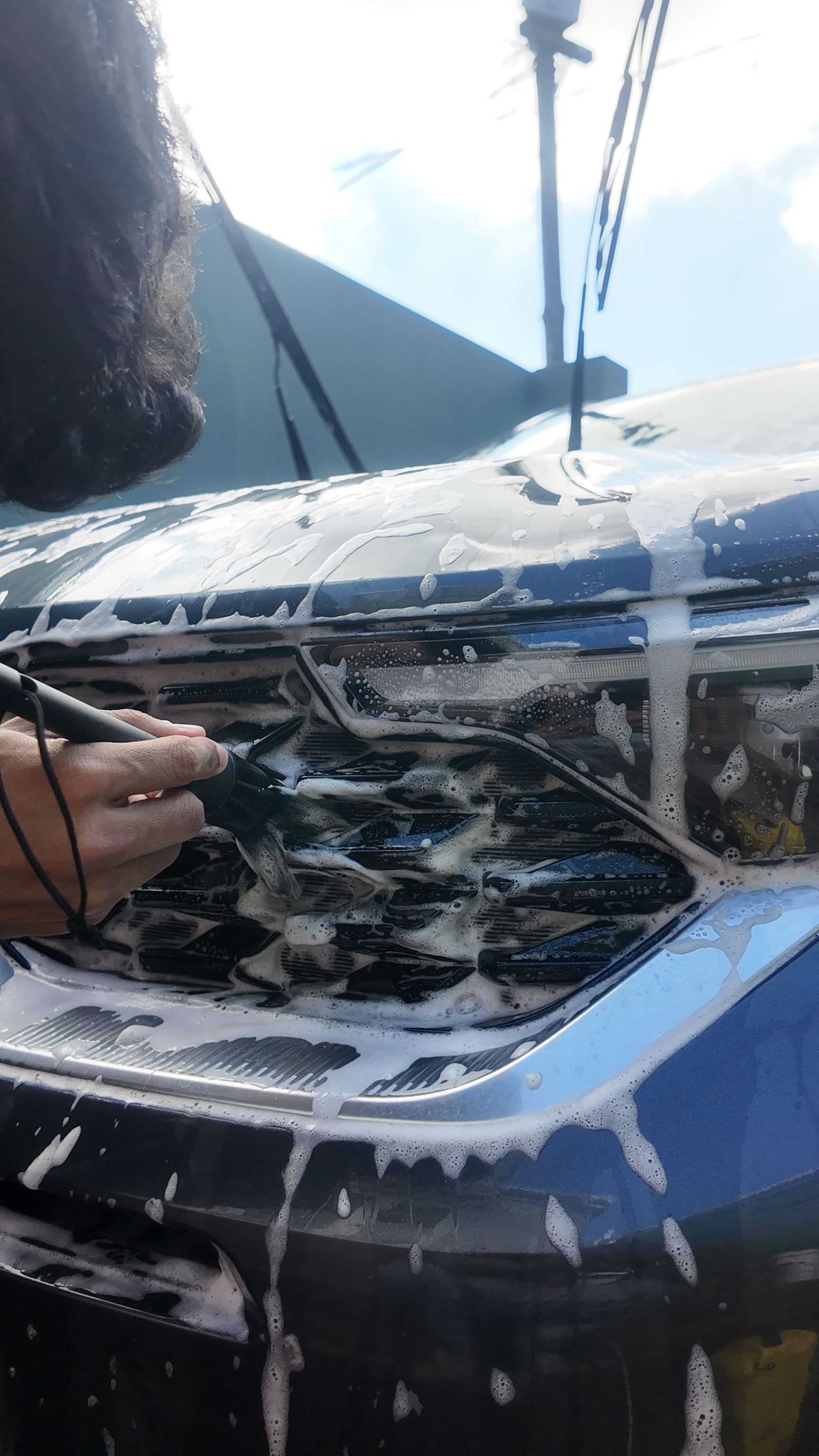 Detailing closeup of Kia grill